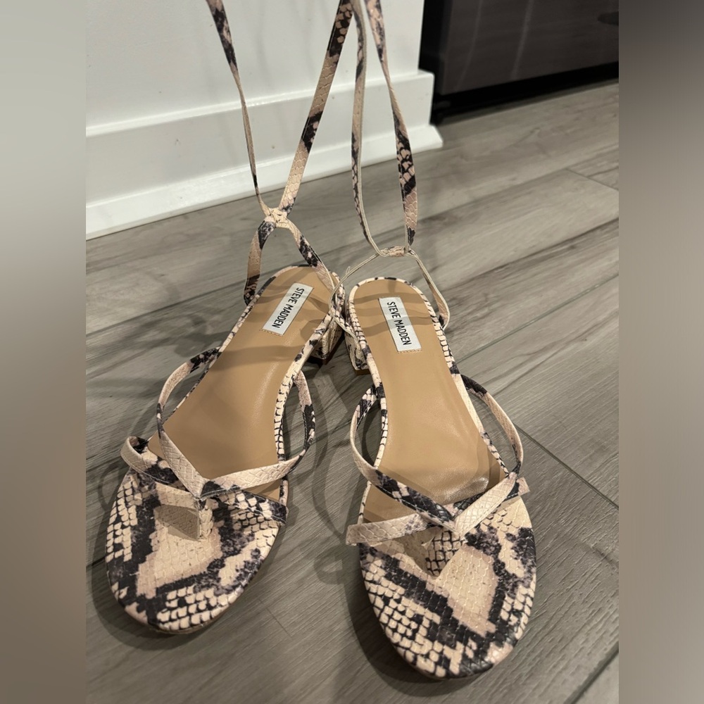 Steve Madden wrap-up sandals with small heel.